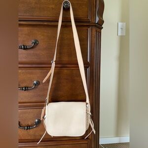 Coach light pink crossbody leather bag good condition, stained from jeans